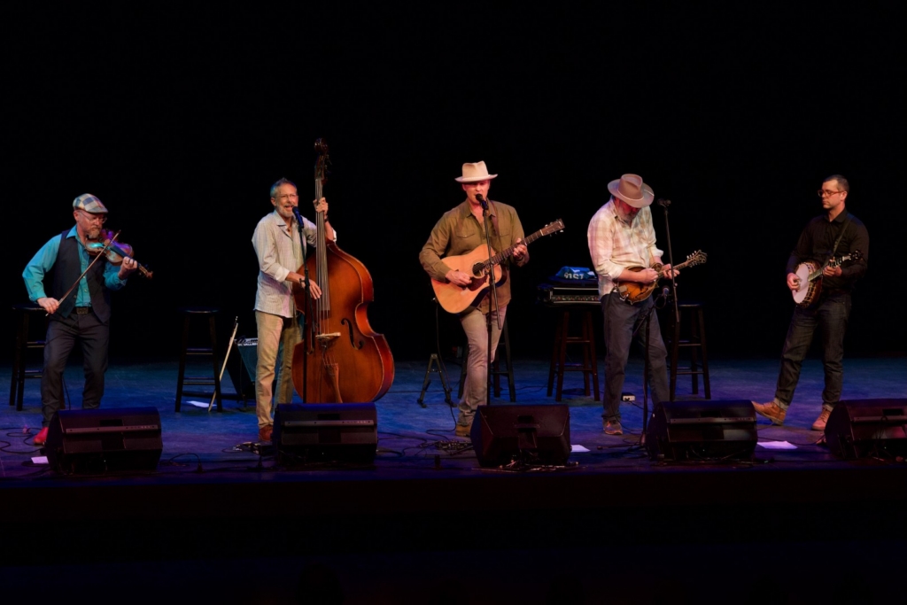 The Bluegrass Gentlemen performing together on stage